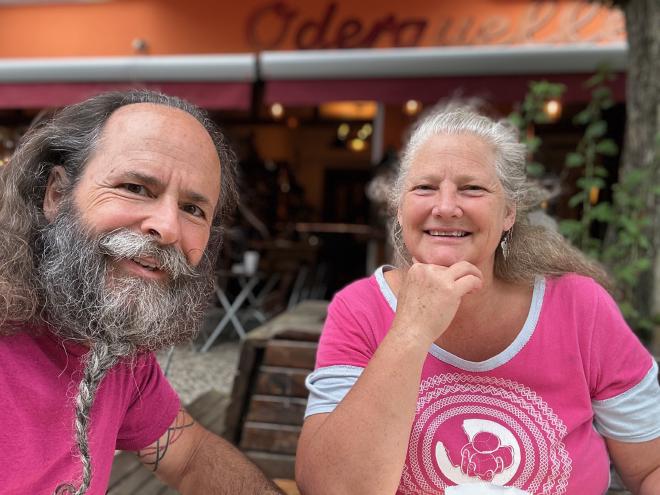 Karen and Greg at an outdoor restaurant
