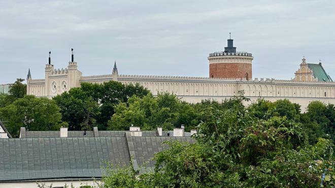 &ldquo;a large castle-like building on a hill&rdquo;