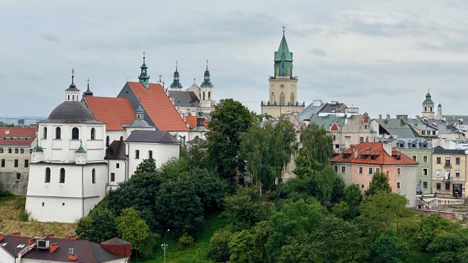 &ldquo;the skyline of an old city with a church tower&rdquo;