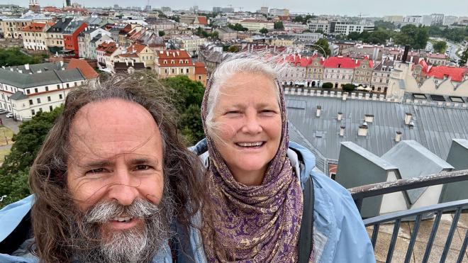 &ldquo;a selfie of Karen and Greg with an old city in the background&rdquo;